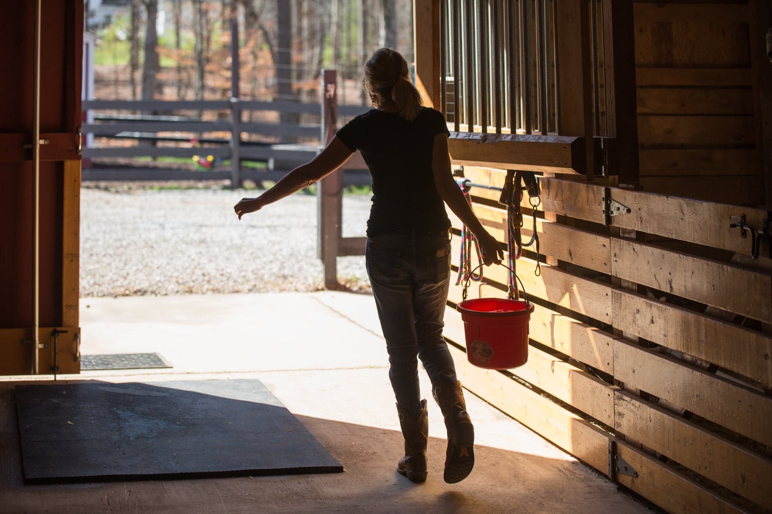 Cathi working in the barn