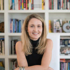 Stephanie Eichhorn in front of a book case