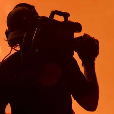 Silhouette of Camera Operator