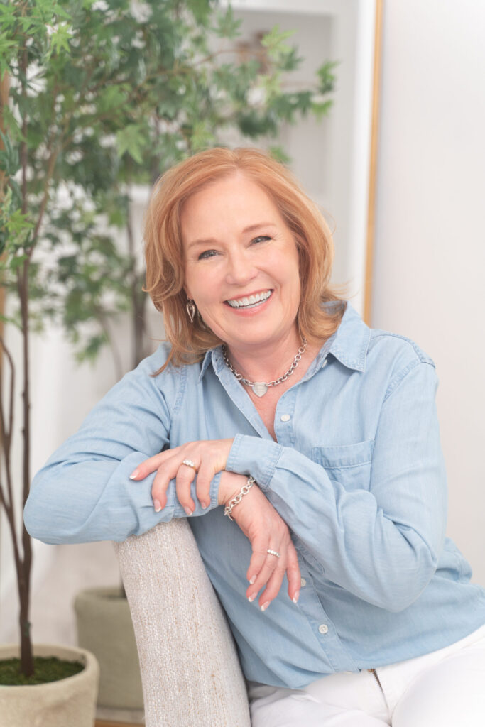Woman smiling broadly for the camera